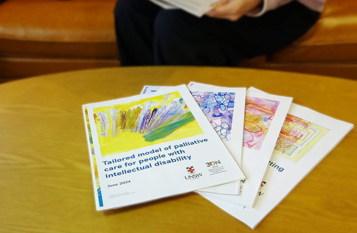Our toolkits fanned out on a table with a person using them